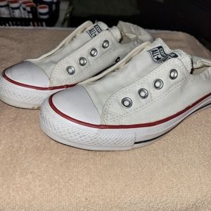 Gently used white slip on converse